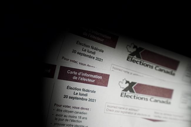 An Elections Canada voter information card is shown on Tuesday, Aug 31, 2021. The 2021 federal election is likely going to be decided by turnout and strategic voting, Leger executive vice-president Christian Bourque says as his firm's latest poll results show the leading two parties in a dead heat. THE CANADIAN PRESS/Sean Kilpatrick