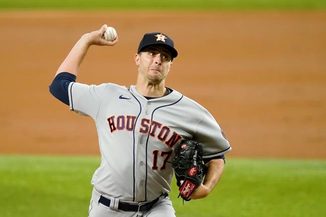 Houston Astros starting pitcher Jake Odorizzi throws in the first inning of a baseball game against the Texas Rangers in Arlington, Texas, Monday, Sept. 13, 2021. (AP Photo/Tony Gutierrez)