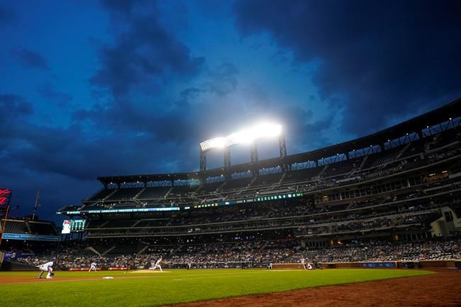 The St. Louis Cardinals play against the New York Mets during the first inning of a baseball game Monday, Sept. 13, 2021, in New York. (AP Photo/Frank Franklin II)