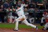 Seattle Mariners' Mitch Haniger follows through on a three-run go-ahead home run against the Boston Red Sox during the seventh inning of a baseball game, Monday, Sept. 13, 2021, in Seattle. (AP Photo/Ted S. Warren)