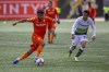Forge FC's Emery Welshman, left, carries the ball past York 9 midfielder Wataru Murofushi during the inaugural soccer match of the Canadian Premier League between Forge FC of Hamilton and York 9 in Hamilton, Ont., on April 27, 2019. THE CANADIAN PRESS/Aaron Lynett