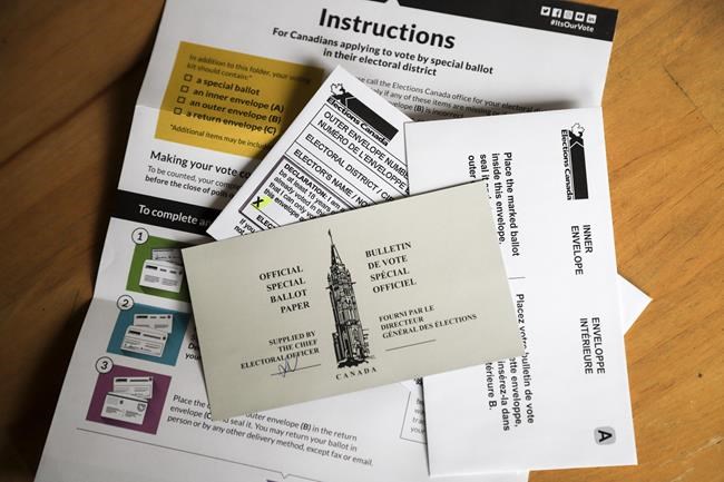 A mail-in voting package that voters will receive if requested is seen in Calgary, Alta., Thursday, Sept. 2, 2021. THE CANADIAN PRESS/Jeff McIntosh