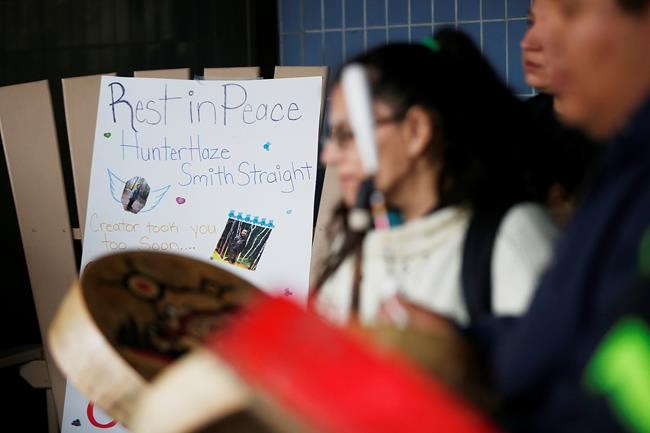 People drum at a vigil for Hunter Haze Smith-Straight outside Winnipeg's Childrens Hospital, Friday, Nov. 1, 2019. THE CANADIAN PRESS/John Woods