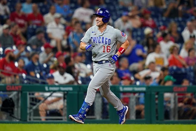 Chicago Cubs' Patrick Wisdom reacts after hitting a two-run home run off Philadelphia Phillies pitcher Kyle Gibson during the fifth inning of a baseball game against the Philadelphia Phillies, Tuesday, Sept. 14, 2021, in Philadelphia. (AP Photo/Matt Slocum)
