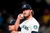 Seattle Mariners relief pitcher Drew Steckenrider waits to be pulled from the baseball game, having given up a three-run double to Boston Red Sox's Kyle Schwarber during the eighth inning of a baseball game Tuesday, Sept. 14, 2021, in Seattle. (AP Photo/Elaine Thompson)