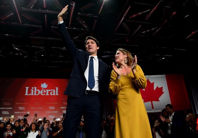 Liberal leader Justin Trudeau and wife Sophie Gregoire Trudeau celebrate at Liberal election headquarters in Montreal on October 22, 2019. THE CANADIAN PRESS/Sean Kilpatrick