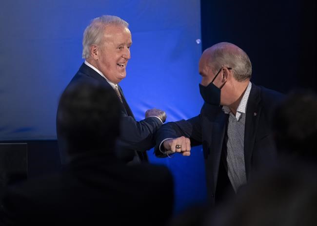 Conservative Leader Erin O'Toole is introduced by former prime minister Brian Mulroney during a campaign rally Wednesday, September 15, 2021 in Orford, Que. THE CANADIAN PRESS/Adrian Wyld