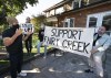 NDP leader Jagmeet Singh speaks with Fairy Creek protesters following a morning media availability in Toronto, Thursday, September 16, 2021. THE CANADIAN PRESS/Jonathan Hayward
