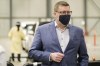 Premier Scott Moe during a tour of the COVID-19 mass immunization clinic and drive-thru immunization space at International Trade Centre in Regina on Thursday, Feb. 18, 2021. THE CANADIAN PRESS/Michael Bell