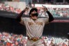 San Diego Padres' Fernando Tatis Jr. celebrates after hitting a home run against the San Francisco Giants during the third inning of a baseball game in San Francisco, Thursday, Sept. 16, 2021. (AP Photo/Jeff Chiu)