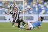 Juventus' Dejan Kulusevski, left, and Napoli's Eljif Elm, vie for the ball during the Italian Serie A soccer match between Napoli and Juventus at the Diego Maradona stadium in Naples, Italy, Saturday, Sept. 11, 2021. (Alessandro Garofalo/LaPresse via AP)