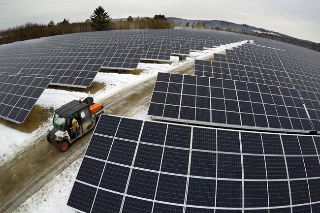 Solar panels stretch across 38 acres at the BNRG/Dirigo solar farm, Thursday, Jan. 14, 2021, in Oxford, Maine. THE CANADIAN PRESS/AP-Robert F. Bukaty