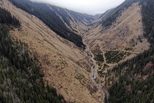 A Nov. 14, 2020 photograph released by the Agent Green NGO shows an area of suspected illegal deforestation in Valea Rea, Romania's southeast Fagaras Mountains. The European Commission launched infringement procedures against Romania for failing to effectively prevent illegal logging, and for not respecting EU legislation in protected Natura 2000 sites.(Agent Green via AP)