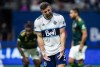Vancouver Whitecaps' Lucas Cavallini reacts after being stopped by Portland Timbers goalkeeper Steve Clark during the second half of an MLS soccer game in Vancouver, B.C., Friday, Sept. 10, 2021. THE CANADIAN PRESS/Darryl Dyck
