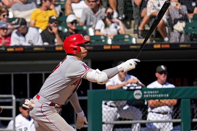 Los Angeles Angels designated hitter Shohei Ohtani, of Japan, hits a single during the fifth inning of a baseball game against the Chicago White Sox in Chicago, Thursday, Sept. 16, 2021. (AP Photo/Nam Y. Huh)