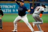Detroit Tigers' Derek Hill (54) grounds out past Tampa Bay Rays first baseman Ji-Man Choi during the fifth inning of a baseball game Saturday, Sept. 18, 2021, in St. Petersburg, Fla. (AP Photo/Scott Audette)