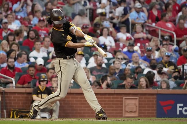 San Diego Padres' Yu Darvish hits a single during the third inning of a baseball game against the St. Louis Cardinals Saturday, Sept. 18, 2021, in St. Louis. (AP Photo/Jeff Roberson)