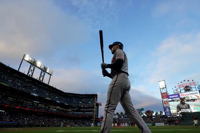 Atlanta Braves' Freddie Freeman walks to the on-deck circle during the fourth inning of the team's baseball game against the San Francisco Giants in San Francisco, Saturday, Sept. 18, 2021. (AP Photo/Jeff Chiu)
