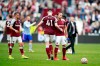 West Ham's Declan Rice, left, and Mark Noble react after the English Premier League soccer match between West Ham United and Manchester United at the London Stadium in London, England, Sunday, Sept. 19, 2021. Manchester United won 2-1. (AP Photo/Ian Walton)