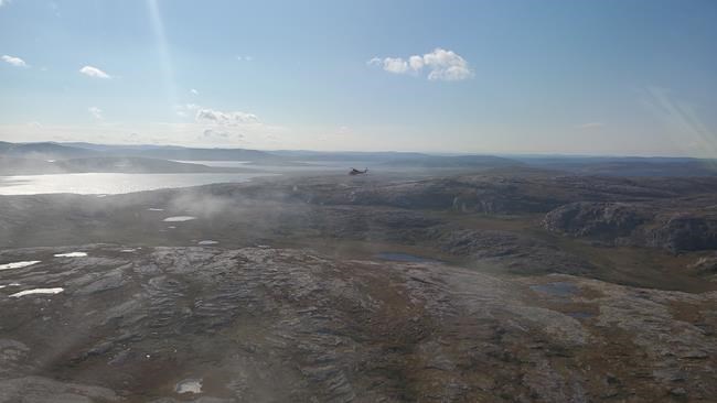 A CH-146 Griffon from 5 Wing Goose Bay is shown over the search area off Mary's Harbour, N.L., in this Saturday, Sept. 18, 2021 handout photo. A search is underway for an overdue fishing vessel with two men on board that departed a small coastal community in Labrador on Friday morning. The nine-metre boat with two outboard motors departed the community of Mary's Harbour at approximately 6 a.m., equipped with a VHF radio. THE CANADIAN PRESS/HO - Department of National Defence