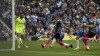 Leicester City's Jamie Vardy scores during the English Premier League soccer match between Brighton & Hove Albion and Leicester City at the AMEX Stadium, Brighton, England, Sunday Sept. 19, 2021. (Steven Paston/PA via AP)