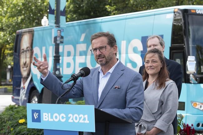Bloc Quebecois Leader Yves-Francois Blanchet speaks at a news conference in front of the National Assembly, in Quebec City, Saturday, Sept. 18, 2021. Blanchet is accompanied by local candidates. Canadians are going to the polls on Sept. 20 in a general election. THE CANADIAN PRESS/Jacques Boissinot