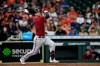 Arizona Diamondbacks' Carson Kelly hits an RBI single against the Houston Astros during the fourth inning of a baseball game Sunday, Sept. 19, 2021, in Houston. (AP Photo/David J. Phillip)