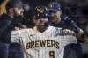 Milwaukee Brewers' Manny Pina reacts after hitting a home run during the eighth inning of a baseball game against the Chicago Cubs Saturday, Sept. 18, 2021, in Milwaukee. (AP Photo/Morry Gash)