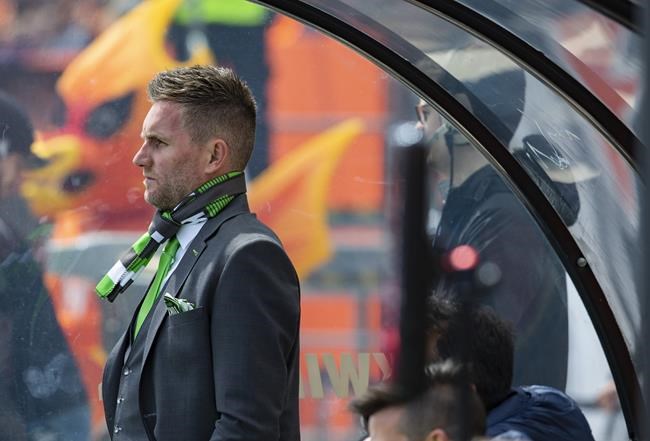 York 9 coach and former Toronto FC player Jim Brennan looks to the pitch during the inaugural soccer match of the Canadian Premier League between Forge FC of Hamilton and York 9 in Hamilton, Ont. Saturday, April 27, 2019. THE CANADIAN PRESS/Aaron Lynett