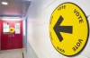 An arrow points to where people can go to cast their ballots on federal election day in Montreal, Monday, September 20, 2021. THE CANADIAN PRESS/Graham Hughes