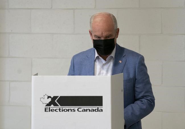 Conservative leader Erin O'Toole prepares to cast his ballot in the federal election Monday, September 20, 2021 in Bowmanville, Ontario. THE CANADIAN PRESS/Adrian Wyld