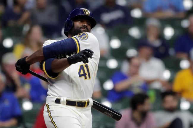 Milwaukee Brewers' Jackie Bradley Jr. swings and misses a pitch during the eighth inning of a baseball game against the St. Louis Cardinals, Monday, Sept. 20, 2021, in Milwaukee. (AP Photo/Aaron Gash)