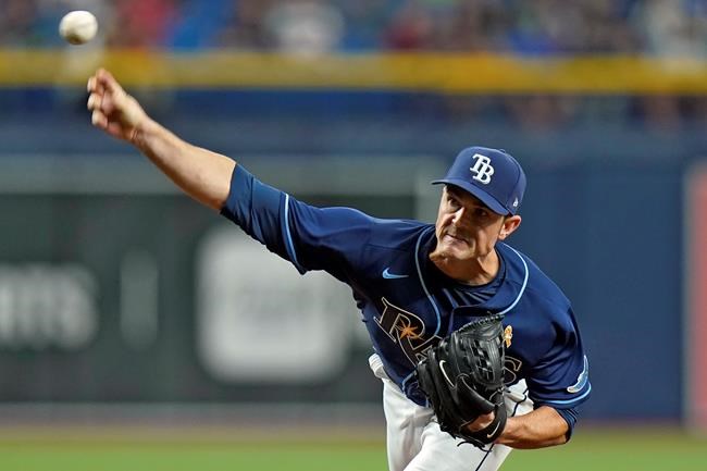 Tampa Bay Rays pitcher David Robertson delivers to the Boston Red Sox during the eighth inning of a baseball game Wednesday, Sept. 1, 2021, in St. Petersburg, Fla. (AP Photo/Chris O'Meara)