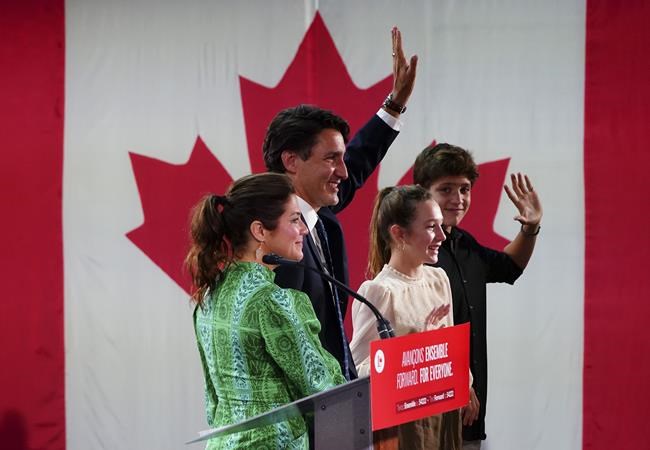 Prime Minister Justin Trudeau is joined on stage by wife Sophie Gregoire Trudeau, left, and children Xavier and Ella-Grace, during his victory speech at Party campaign headquarters in Montreal, early Tuesday, Sept. 21, 2021. THE CANADIAN PRESS/Sean Kilpatrick