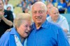 FILE - Tommy Lasorda and his wife Jo hug as they watch a video tribute to Tommy prior to the Los Angeles Dodgers' baseball game against the Colorado Rockies in Los Angeles, in this Saturday, Sept. 28, 2013, file photo. Jo Lasorda has died. She was 91. She died Monday night, Sept. 20, 2021, at her home in Fullerton, the team said Tuesday. No cause of death was given. (AP Photo/Mark J. Terrill)
