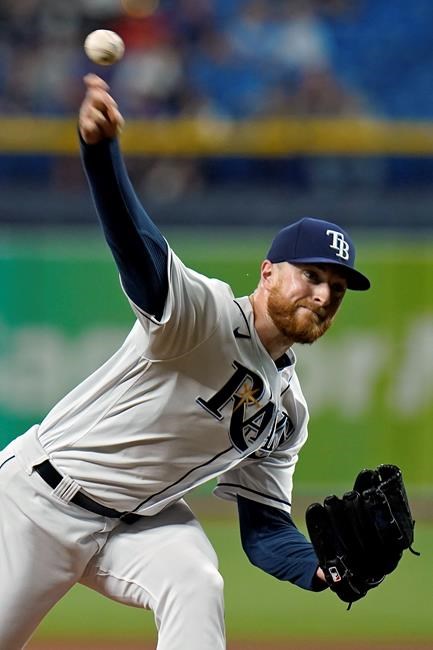 Tampa Bay Rays' Drew Rasmussen pitches to the Toronto Blue Jays during the first inning of a baseball game Tuesday, Sept. 21, 2021, in St. Petersburg, Fla. (AP Photo/Chris O'Meara)