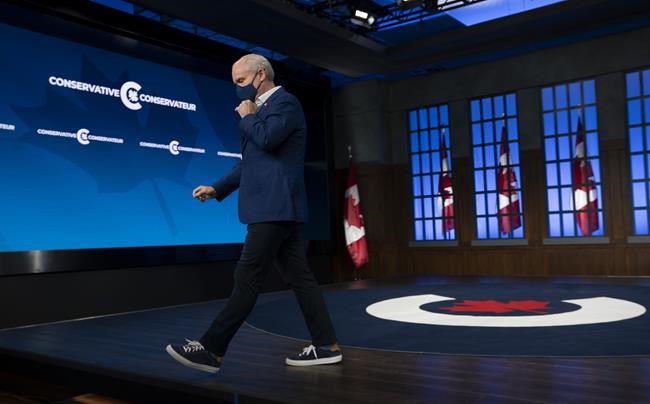 Conservative leader Erin O'Toole leaves the set where he spend much of the election following a news conference Tuesday, September 21, 2021 in Ottawa.THE CANADIAN PRESS/Adrian Wyld
