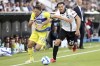 Juventus' Federico Chiesa, left, and Spezia's Simone Bastoni vie for the ball during the Italian Serie A soccer match between Spezia and Juventus, at the Alberto Picco stadium in La Spezia, Italy, Wednesday, Sept. 22, 2021. (Tano Pecoraro/LaPresse via AP)