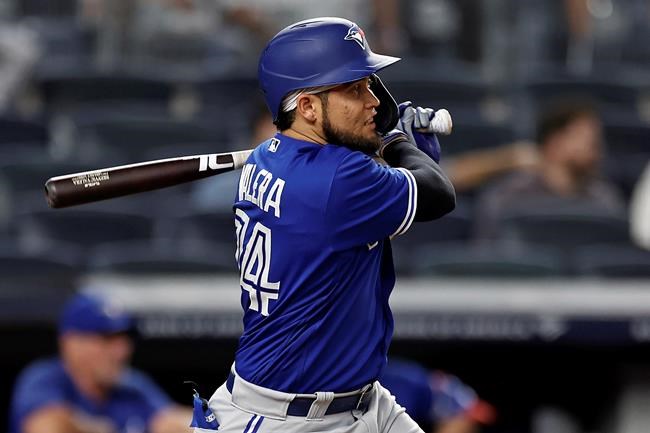 Toronto Blue Jays' Breyvic Valera watches his RBI double against the New York Yankees during the ninth inning of a baseball game Thursday, Sept. 9, 2021, in New York. THE CANADIAN PRESS/AP-Adam Hunger