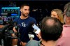 Tampa Bay Rays' Kevin Kiermaier, left, talks to reporters before a baseball game against the Toronto Blue Jays Wednesday, Sept. 22, 2021, in St. Petersburg, Fla. Kiermaier was answering questions about him picking up the Blue Jays pitch data card after being tagged out at home plate by catcher Alejandro Kirk during Monday's game. (AP Photo/Chris O'Meara)