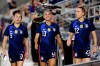 FILE - In this June 13, 2021, file photo, United States defender Kelley O'Hara (5), forward Alex Morgan (13) and midfielder Kristie Mewis (22) walk onto the field before their soccer game against Jamaica in Houston. Morgan says the U.S. women's national team needs to make sure players aren't losing any compensation they currently receive under U.S. Soccer's identical contract proposals for both the men's and women's teams. But the team is hopeful for a new collective bargaining agreement that will address players' concerns about equitable pay, she said. (AP Photo/Michael Wyke, File)