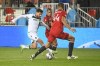 York United FC’s Michael Petrasso, left, works the ball past Toronto FC’s Omar Gonzalez during first half 2021 Canadian Championship quarterfinal soccer action in Toronto on Wednesday, Sept. 22, 2021. THE CANADIAN PRESS/Jon Blacker