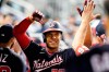 Washington Nationals' Juan Soto is cheered by the team after hitting a two-run home run in the third inning of a baseball game against the Miami Marlins, Wednesday, Sept. 22, 2021, in Miami. (AP Photo/Marta Lavandier)