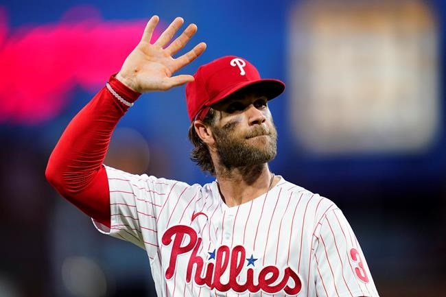 Philadelphia Phillies' Bryce Harper waves to the crowd before an interleague baseball game against the Baltimore Orioles, Wednesday, Sept. 22, 2021, in Philadelphia. (AP Photo/Matt Slocum)