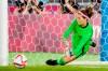 Canada's Stephanie Labbé makes a save against Sweden in the sixth round of the penalty shoot-out in the women's soccer final during the summer Tokyo Olympics in Yokohama, Japan on Friday, August 6, 2021. THE CANADIAN PRESS/Frank Gunn