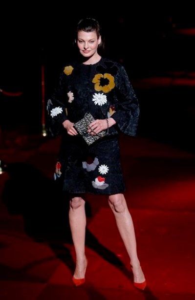Top model Linda Evangelista poses on the runway prior to a Dolce&Gabbana women's spring-summer 2015 show, part of the Milan Fashion Week, unveiled in Milan, on September 21, 2014. Canadian model Linda Evangelista, who commanded catwalks and magazine covers in the 1990s, is opening up about her private struggles with what she characterizes as a cosmetic treatment gone wrong. THE CANADIAN PRESS/AP, Luca Bruno