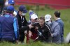 Actor Tom Felton is helped after collapsing on the 18th hole during a practice day at the Ryder Cup at the Whistling Straits Golf Course Thursday, Sept. 23, 2021, in Sheboygan, Wis. (AP Photo/Ashley Landis)