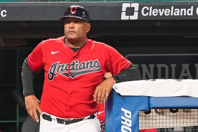 Cleveland Indians' Sandy Alomar Jr. waits to walk on the field during a baseball game against the Kansas City Royals, Tuesday, Sept. 21, 2021, in Cleveland. On Sunday, one of the American League's charter members will play its final home game of 2021, and also its last at Progressive Field as the Indians, the team's name since 1915, when