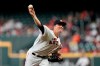 Houston Astros starting pitcher Zack Greinke throws against the Arizona Diamondbacks during the first inning of a baseball game Sunday, Sept. 19, 2021, in Houston. (AP Photo/David J. Phillip)