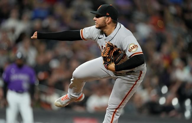 San Francisco Giants relief pitcher Kervin Castro works against the Colorado Rockies in the fifth inning of a baseball game Friday, Sept. 24, 2021, in Denver. (AP Photo/David Zalubowski)